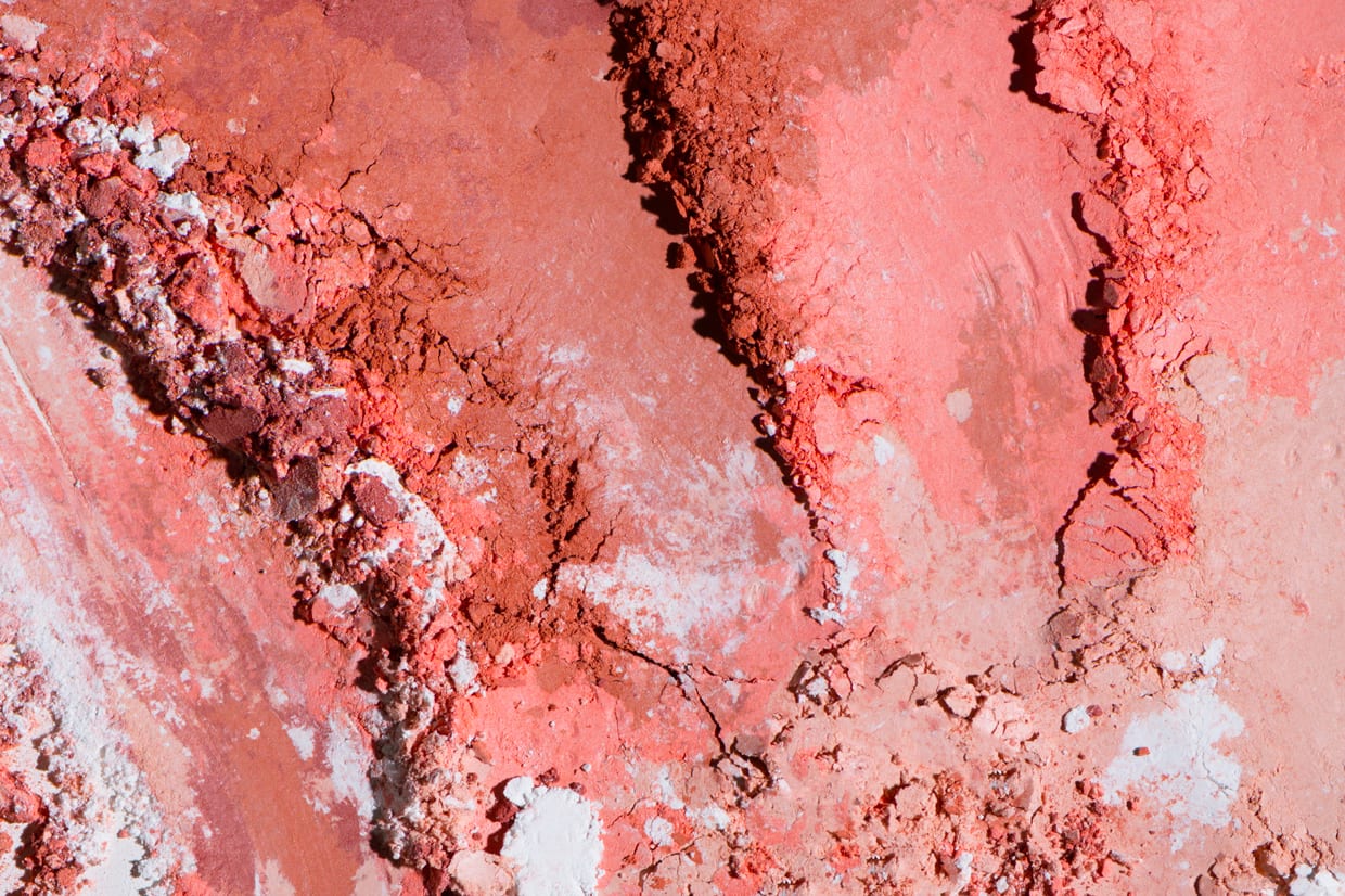 A swatch of crushed powder from a makeup palette.