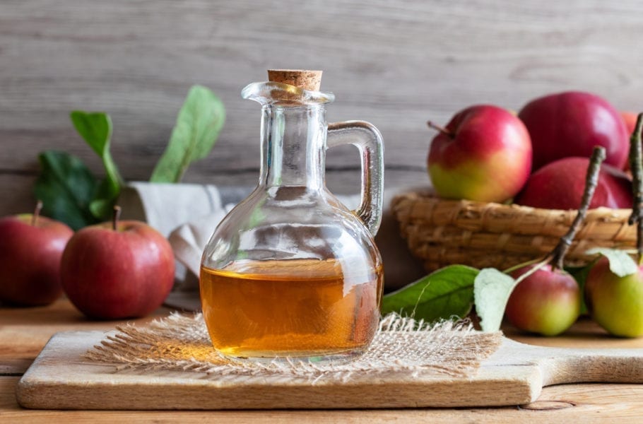 A bottle of apple cider vinegar.