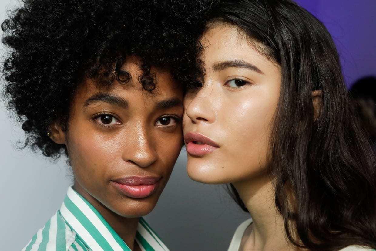 Two models backstage before the Cotton Project fashion show during Sao Paulo Fashion Week N46 Fall/Winter 2019, Oct. 25, 2018.