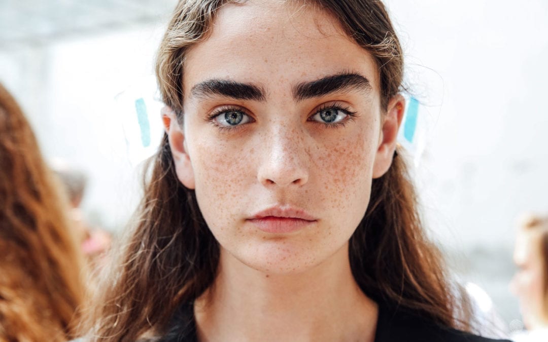 Model backstage at Jil Sander show, Backstage, Spring Summer 2019, Milan Fashion Week, Italy Sep. 19, 2018.