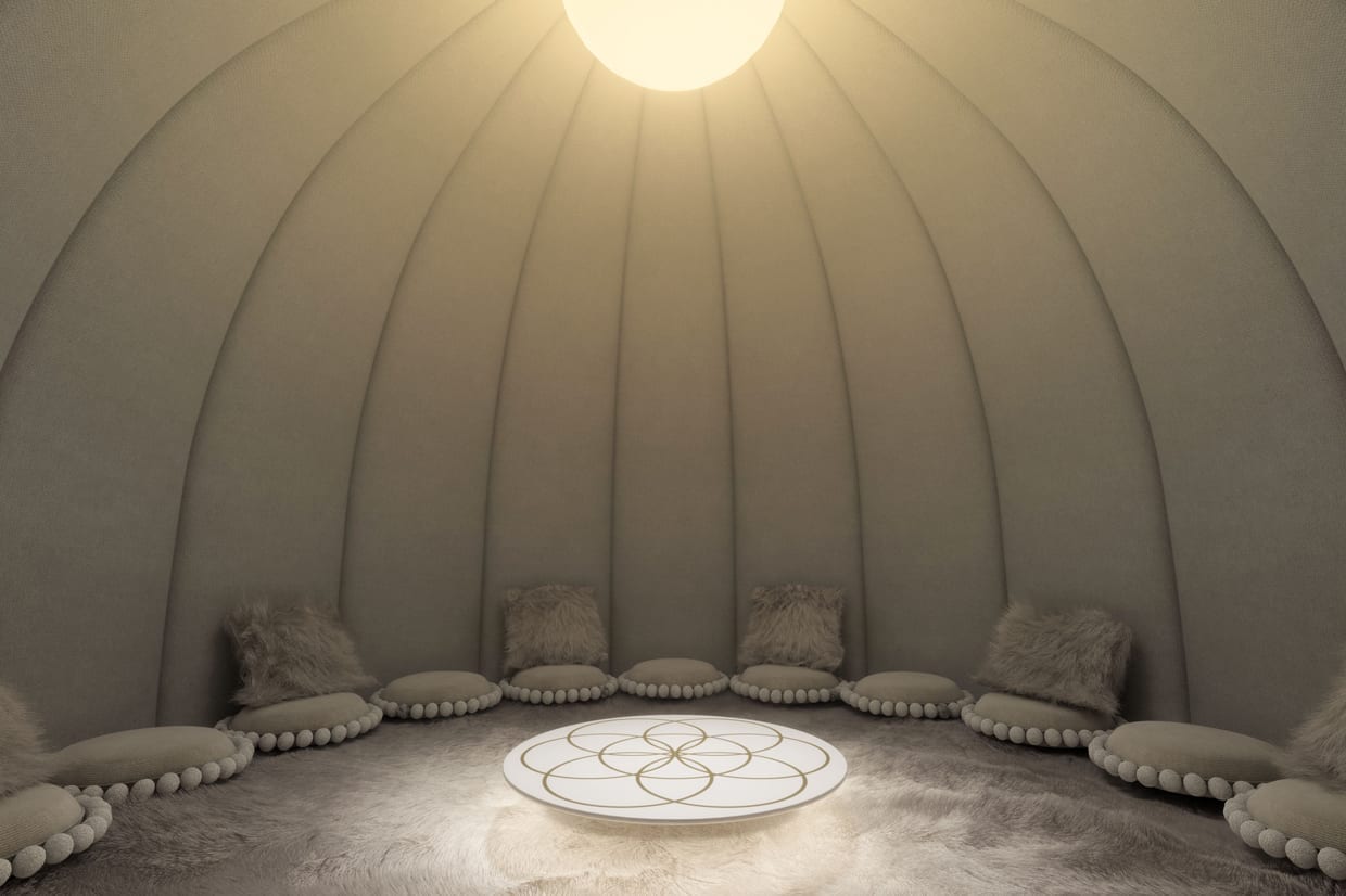 A rendering of the future meditation lounge with pillows, a fur rug, and a skylight at The Well in New York City.