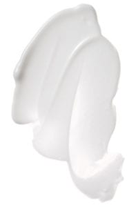 A swipe of Good Genes Lactic Acid on white.