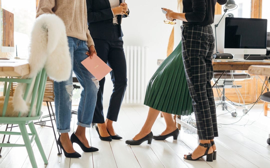 Close up of a female team working in an office.
