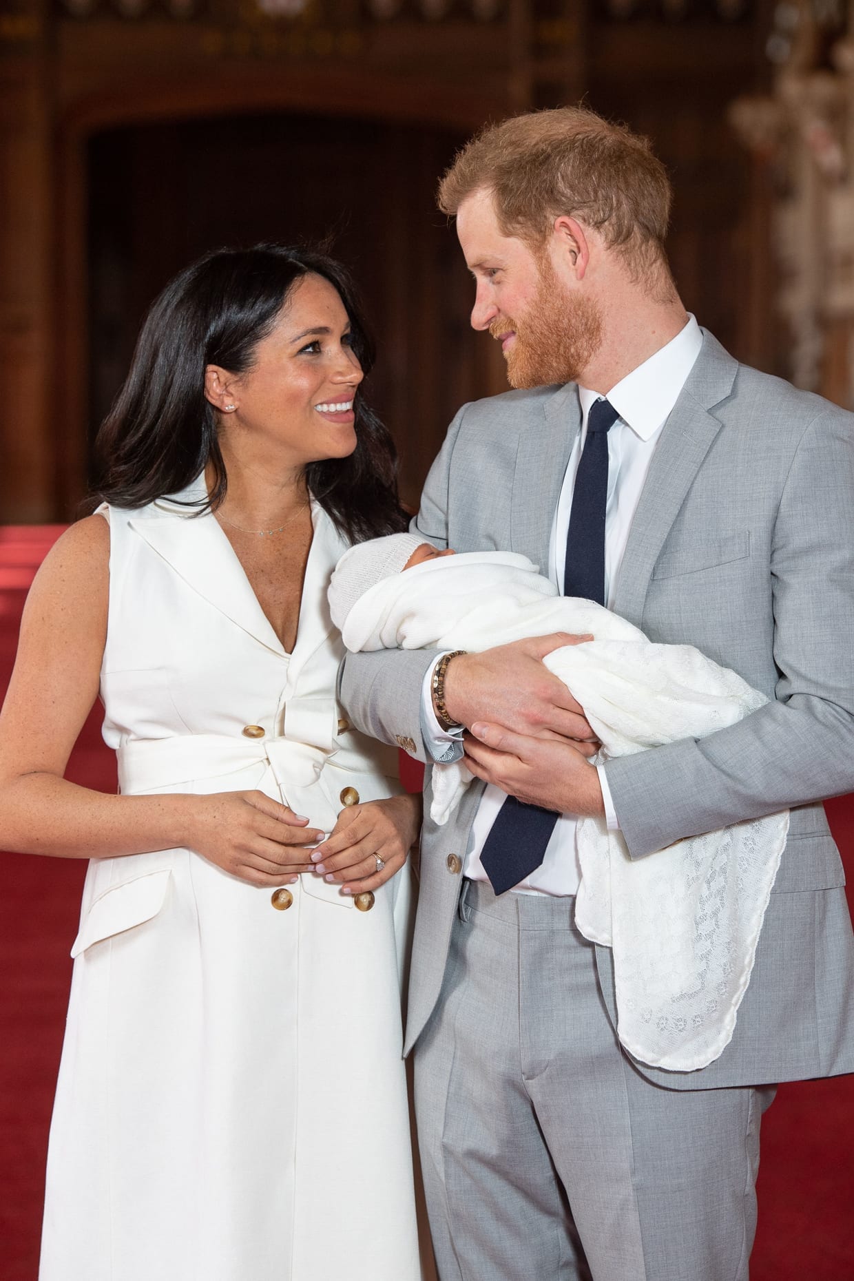 Prince Harry and Meghan Markle pose together with their newborn son, Archie Harrison Mountbatten-Windsor, in Windsor, May 8, 2019.