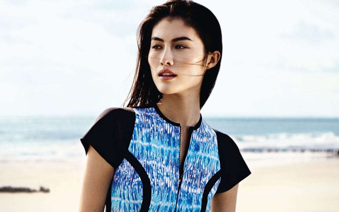 Sui He wears a Lisa Marie Fernandez and Peter Pilotto Collaboration swimsuit, Peter Pilotto skirt and Reed Krakoff cuffs.