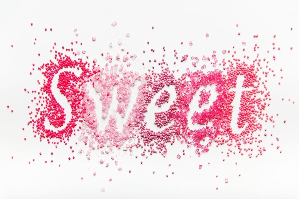Sweet written in candy sprinkles.