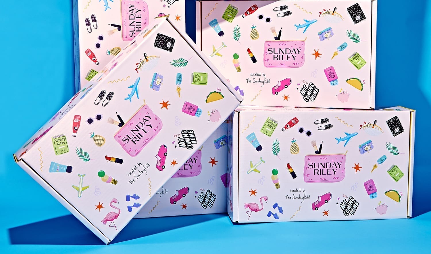 Multiple pink boxes with small illustrations on them on a blue background.