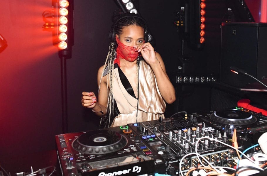 DJ Dede Lovelace poses for a photo during her set.