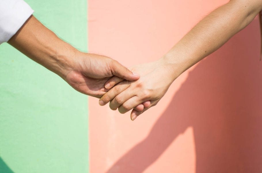 Close up of hand holding.