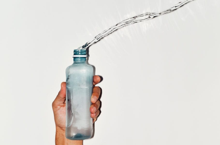 Water spilling from a bottle.