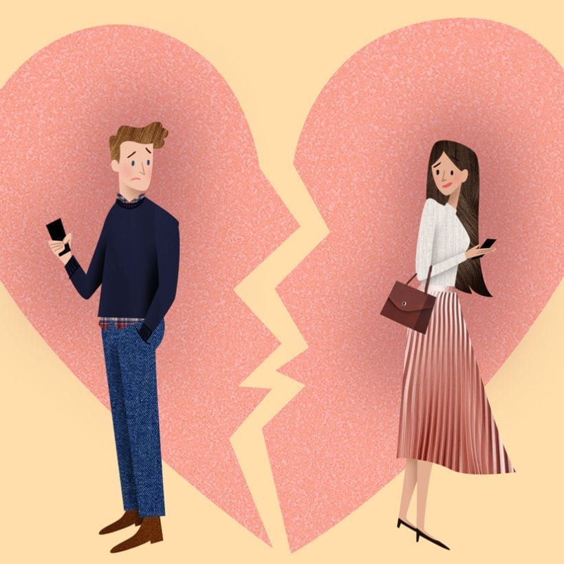 An illustration of a man and a woman holding their phones with their bodies turned away from each other in front of a broken heart.