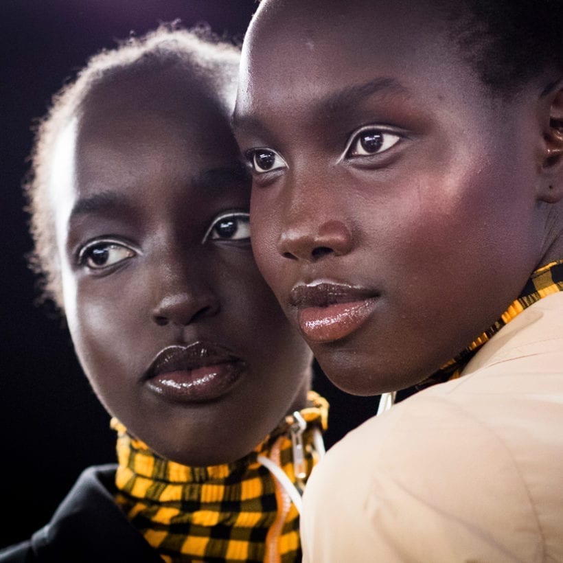 Models pose backstage prior the Kenzo Menswear Spring Summer 2019 show, June 24, 2018, in Paris.