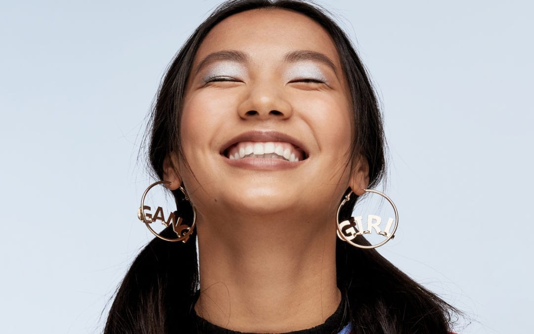 A woman smiling.
