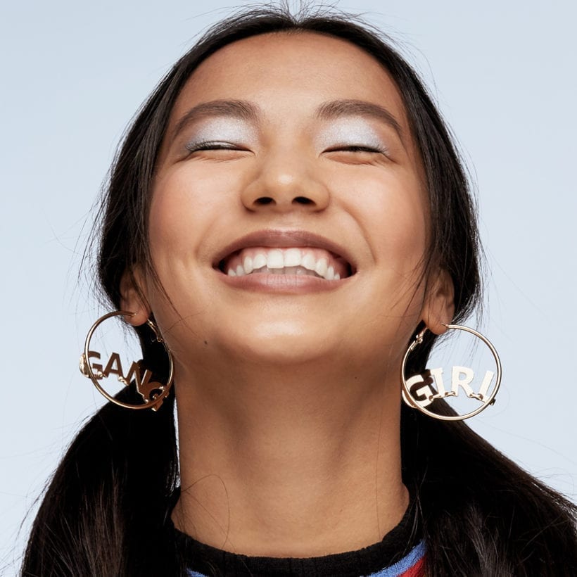 A woman smiling.