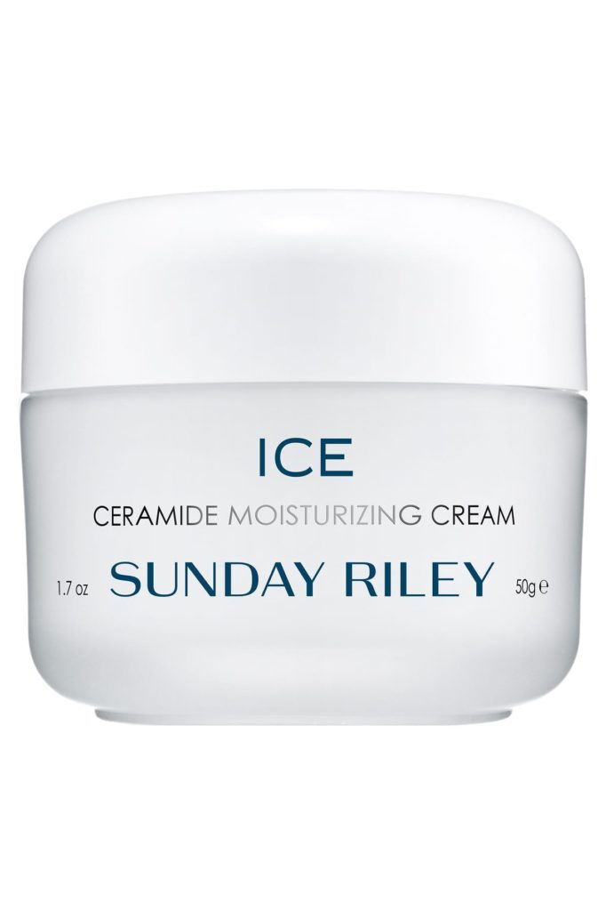 A white container with a white lid and blue and silver text.