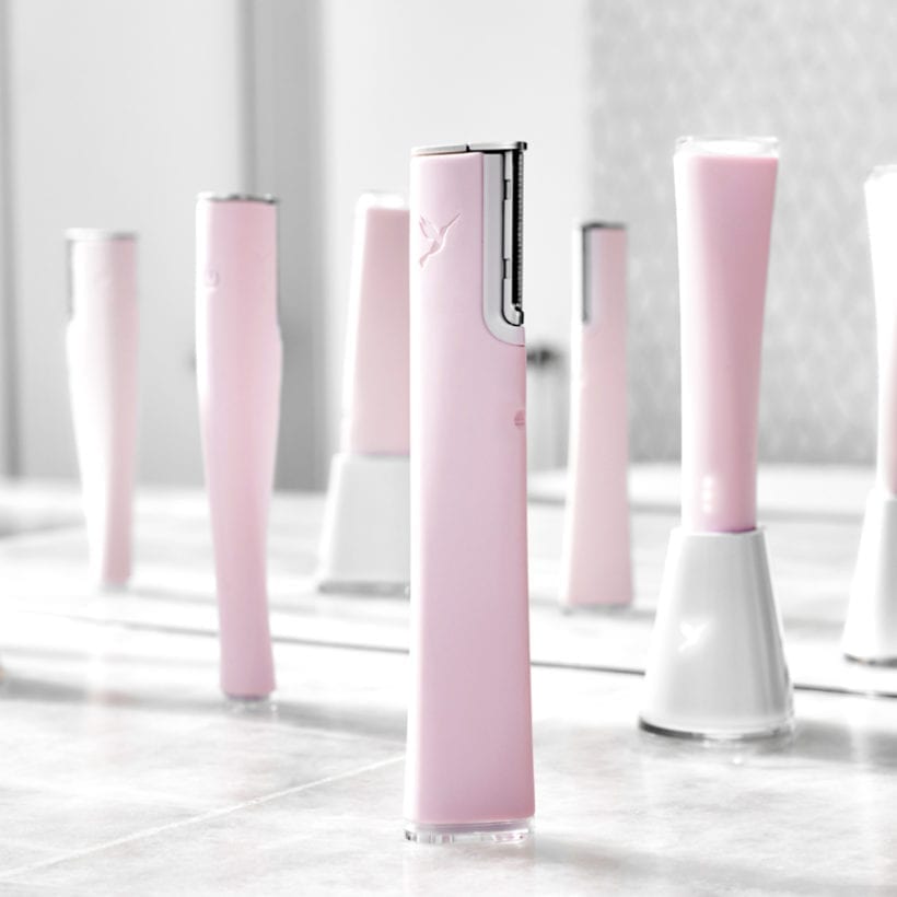 A group of pink and silver beauty skincare gadgets.