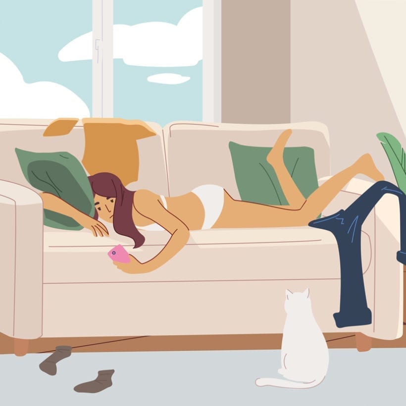 Apathetic young woman lying on sofa in messy room.