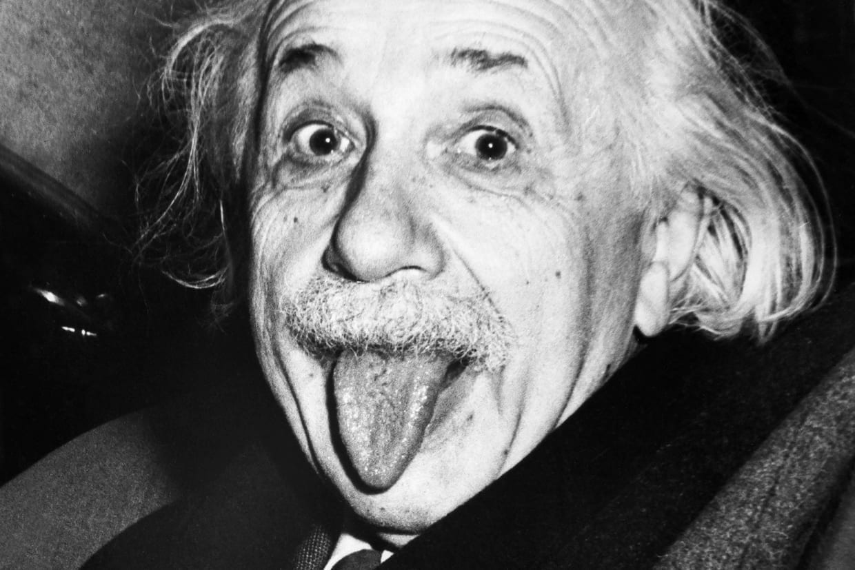 Albert Einstein sticks out his tongue on his 72nd birthday, March 14, 1951.