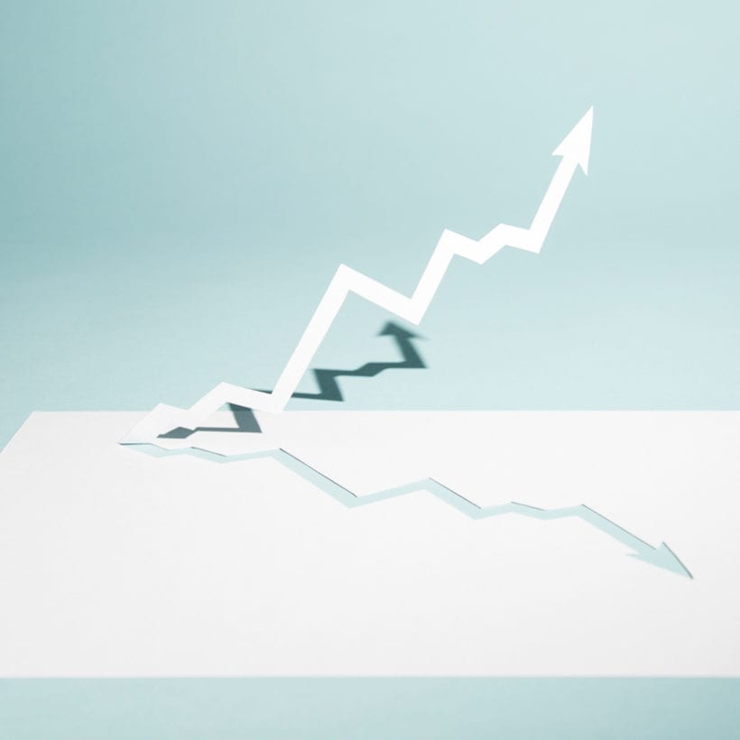 A zig zag paper arrow heads in an upwards direction.