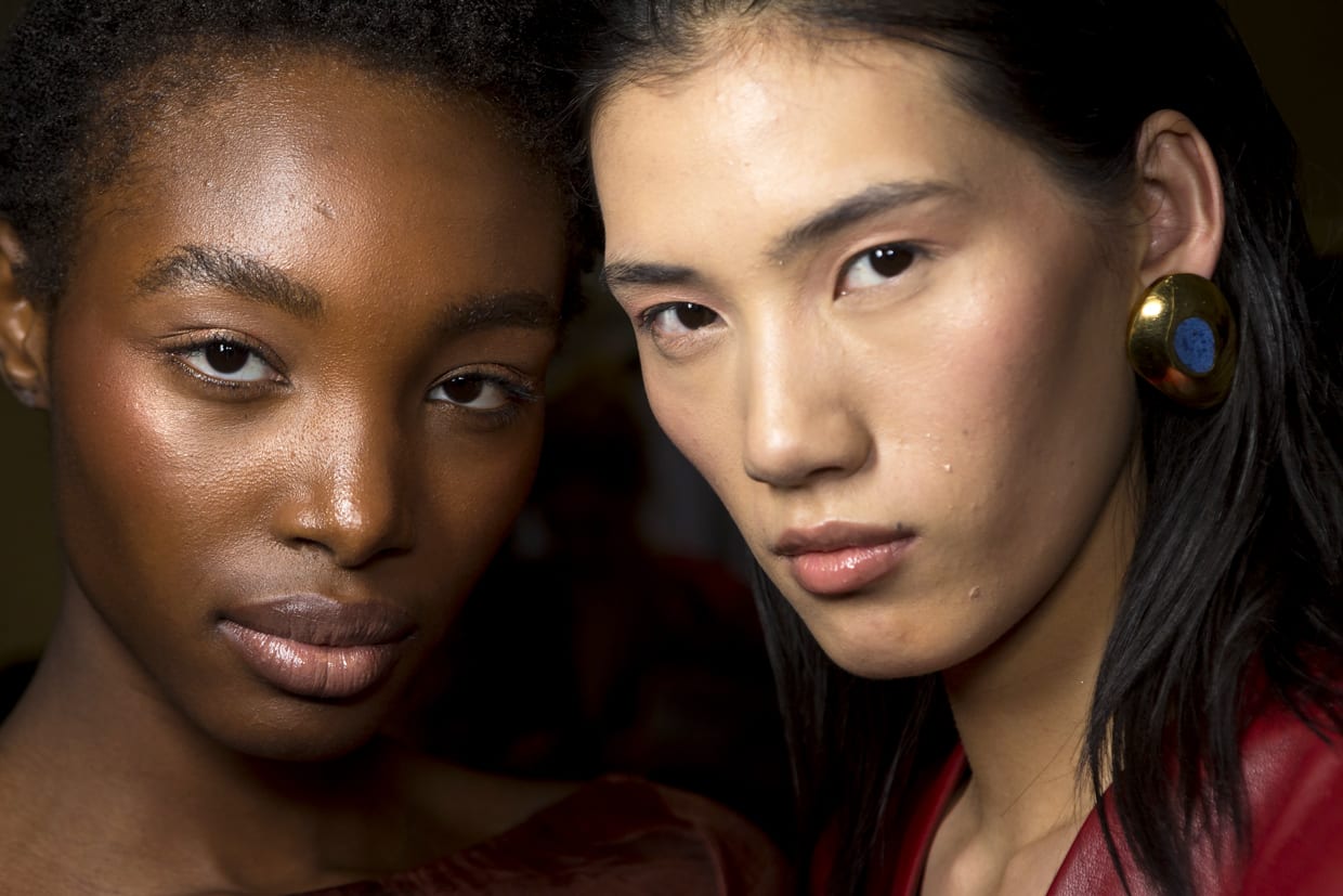 Two models backstage at the Alejandra Alonso Rojas fashion show in New York City, Feb. 12, 2020.