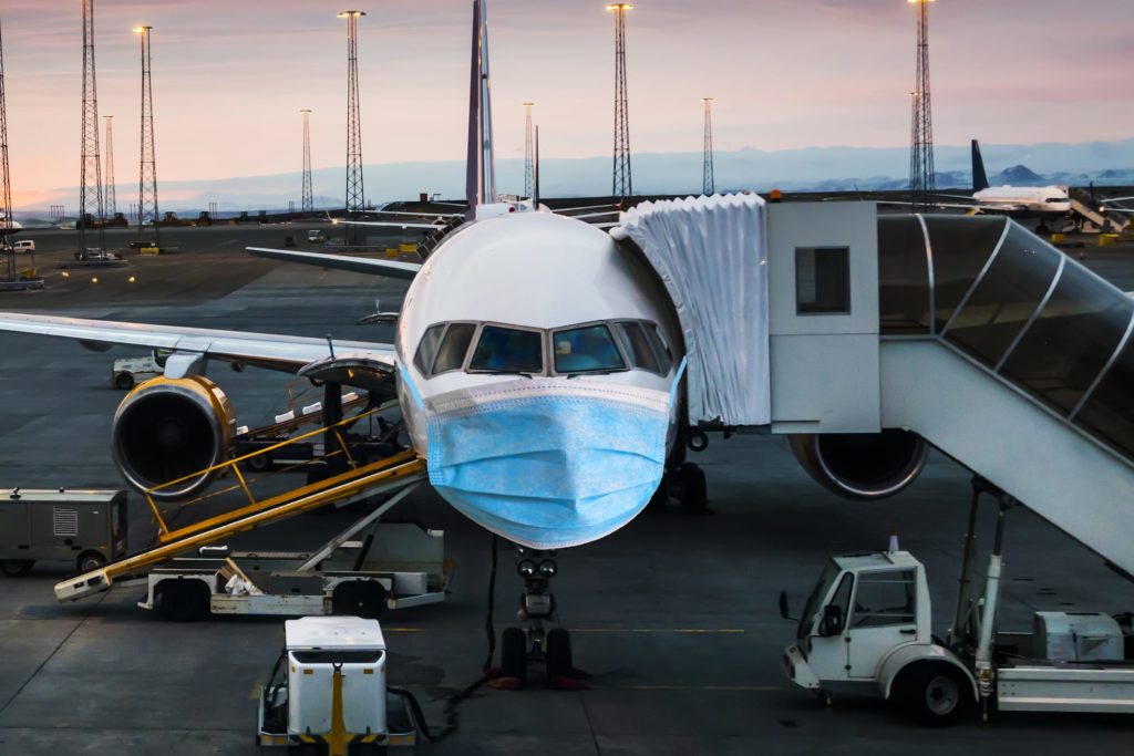 The concept of the spread of coronavirus in the world. Closing air traffic between countries.