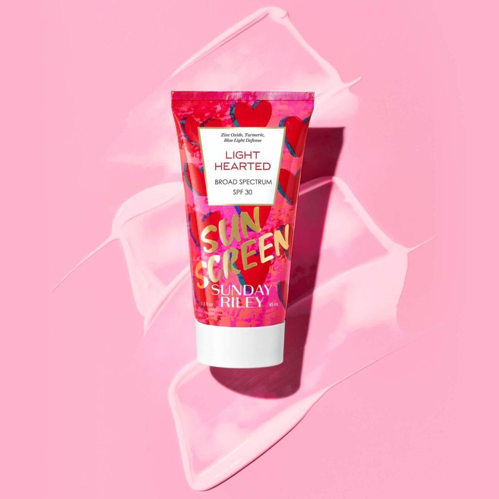 Light Hearted SPF Bottle Goop on the pink background