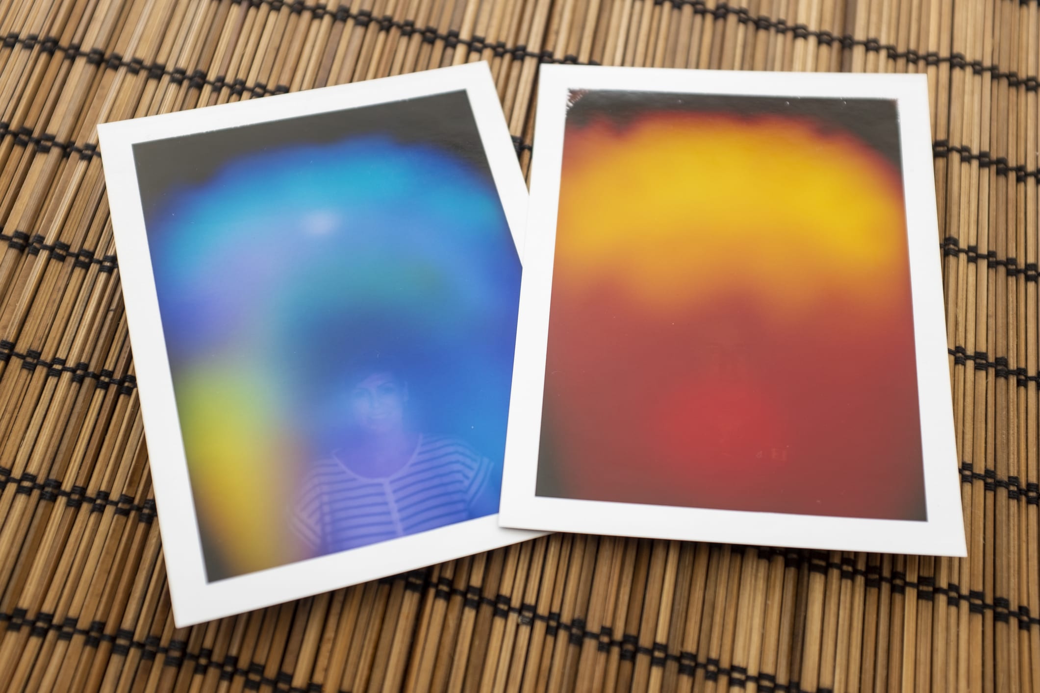 Byron Bay, Australia - November 14, 2014: Printed photos capturing a person's "aura", or the electromagnetic field that surrounds the body. The different colours are said to reveal a particular aspect of your personality.