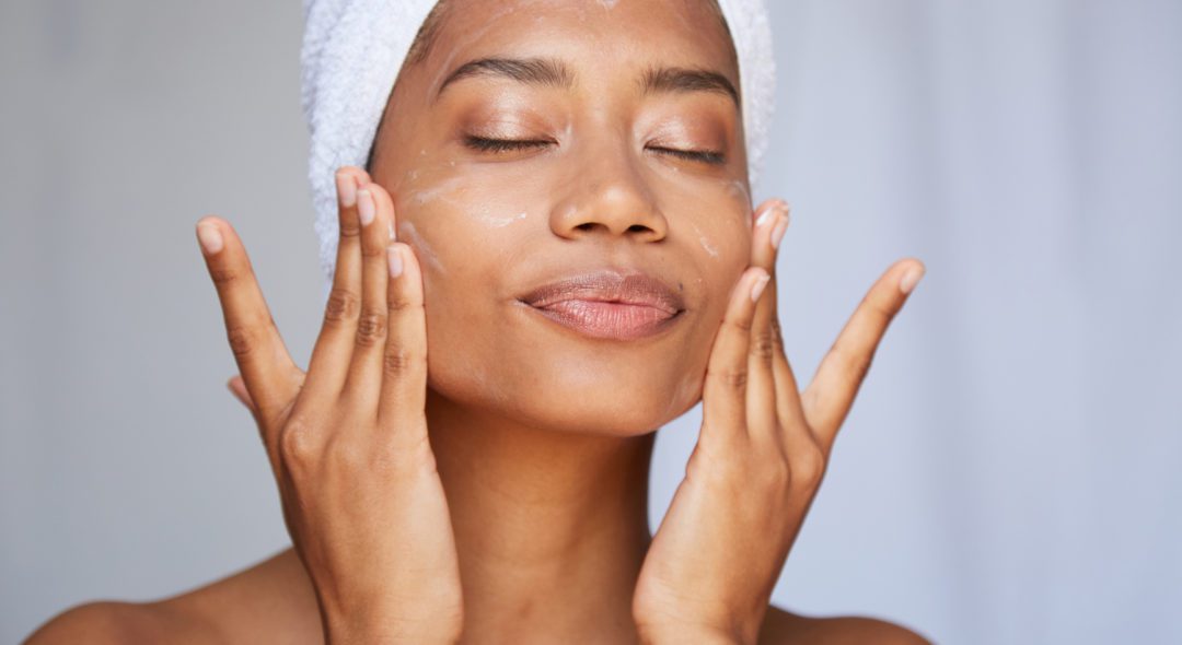 Young beautiful african american woman in skincare and beauty routine studio shoot.