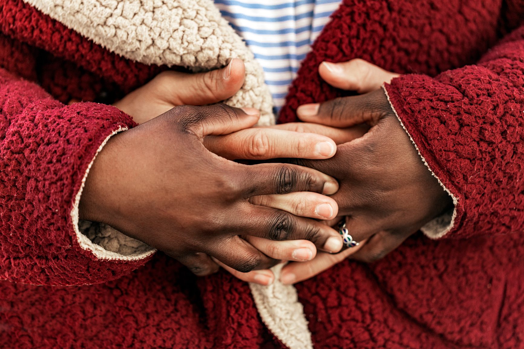 Close Up Of Hands Of Diverse Races