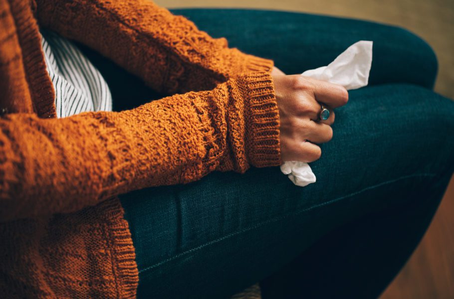 woman holding a tissue in her hand
