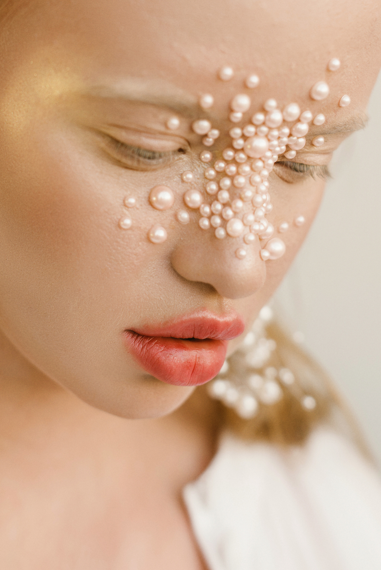 woman with embellishments on face