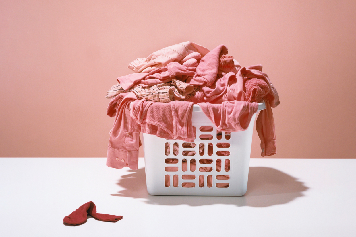 pink laundry on white basket