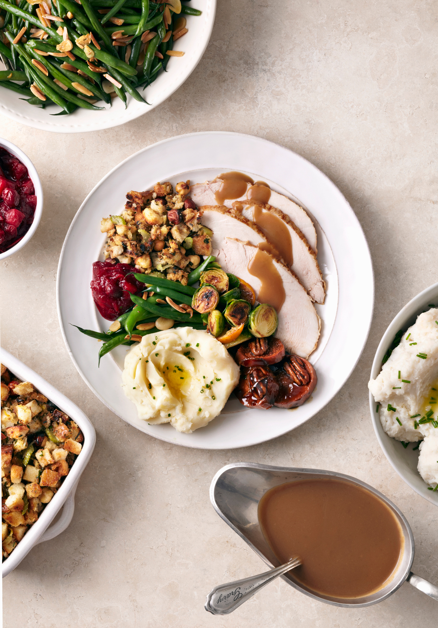 Overhead of turkey meal on white surface