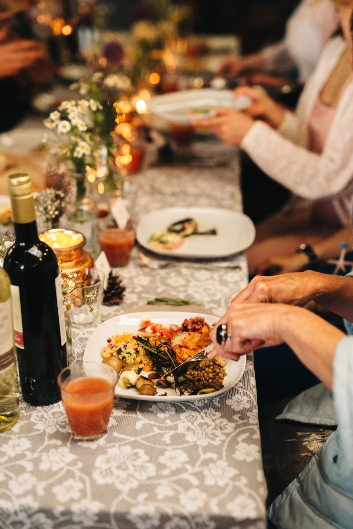 group of people eating and drinking at table