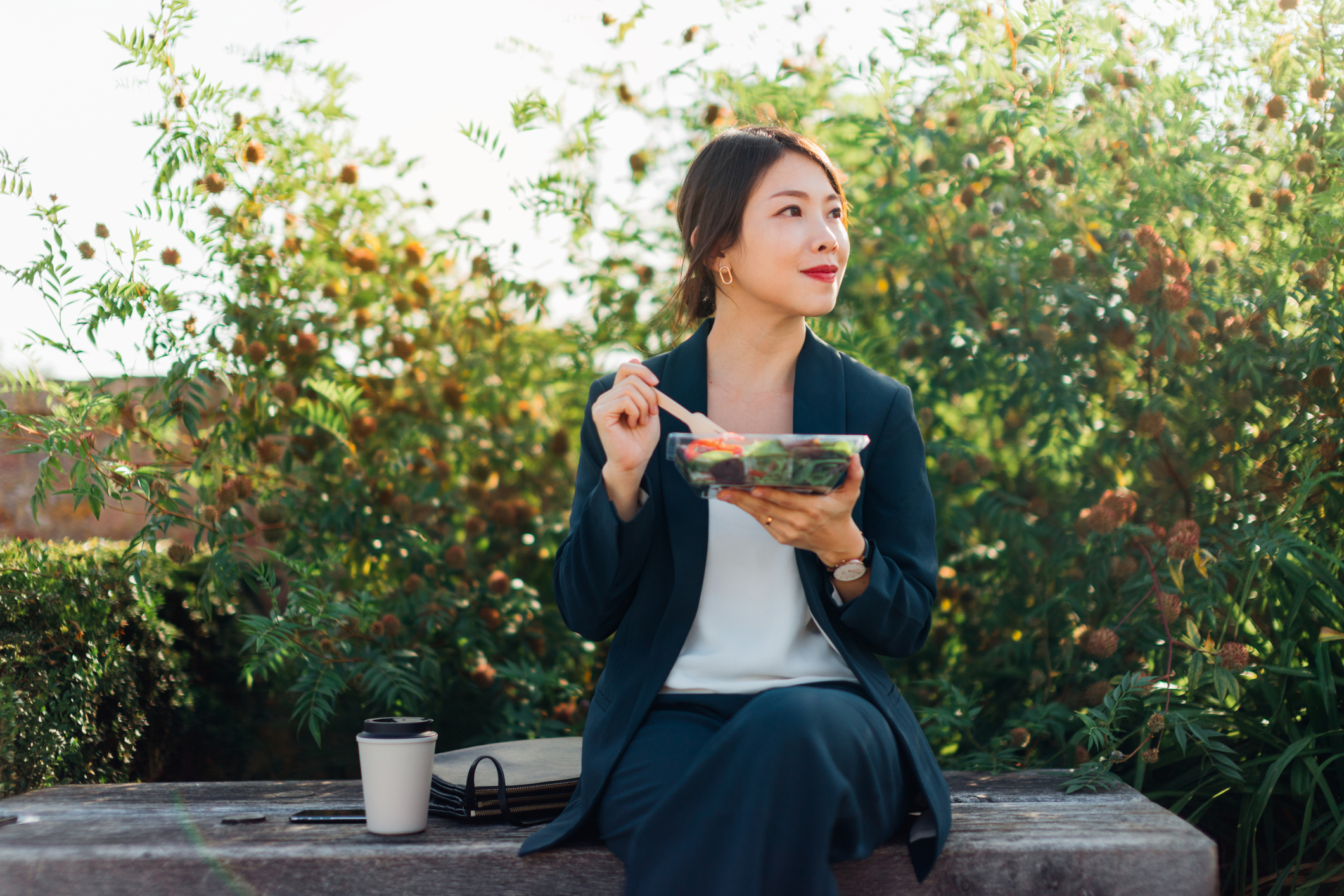Woman Taking A Lunch Break Outdoors