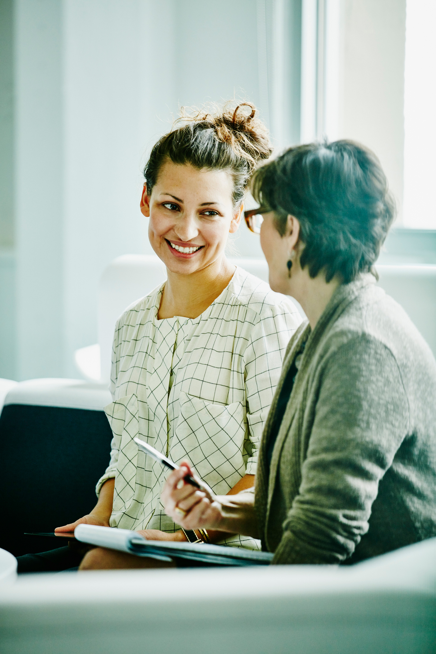 two women in a discussion