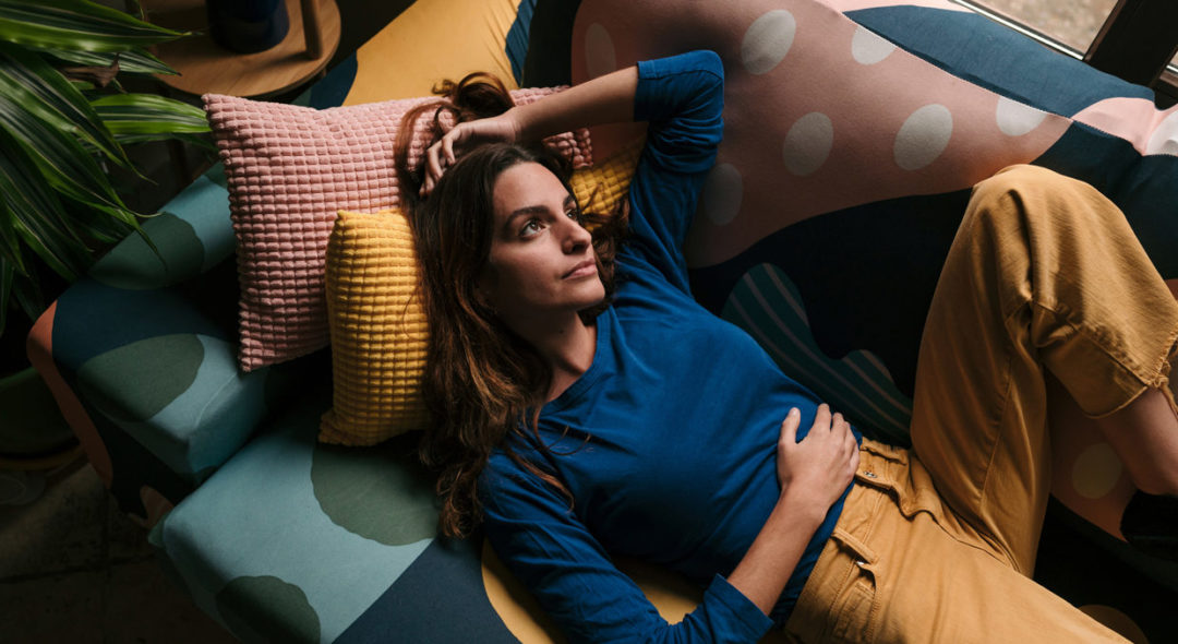 pensive woman on couch