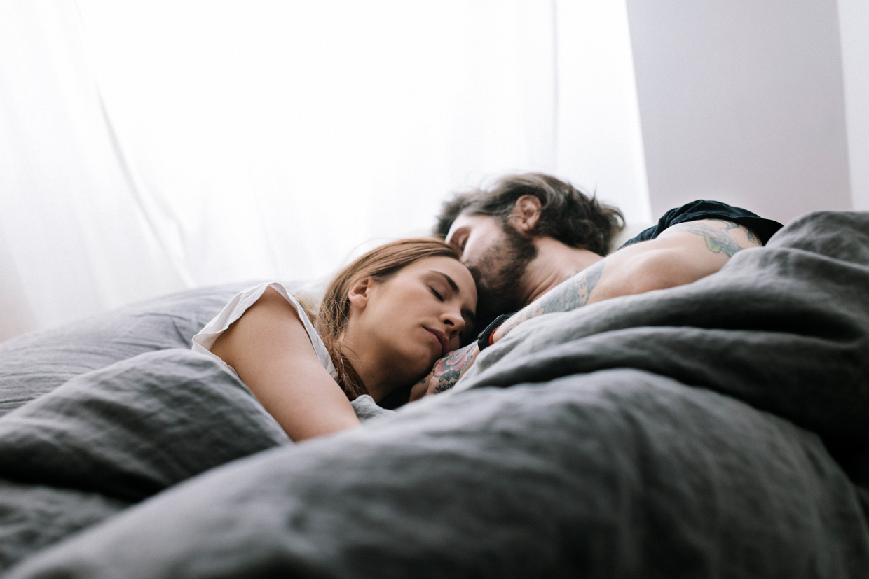 couple sleeping in bed