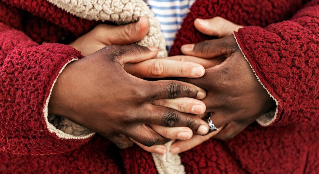 Close up of hands of diverse races