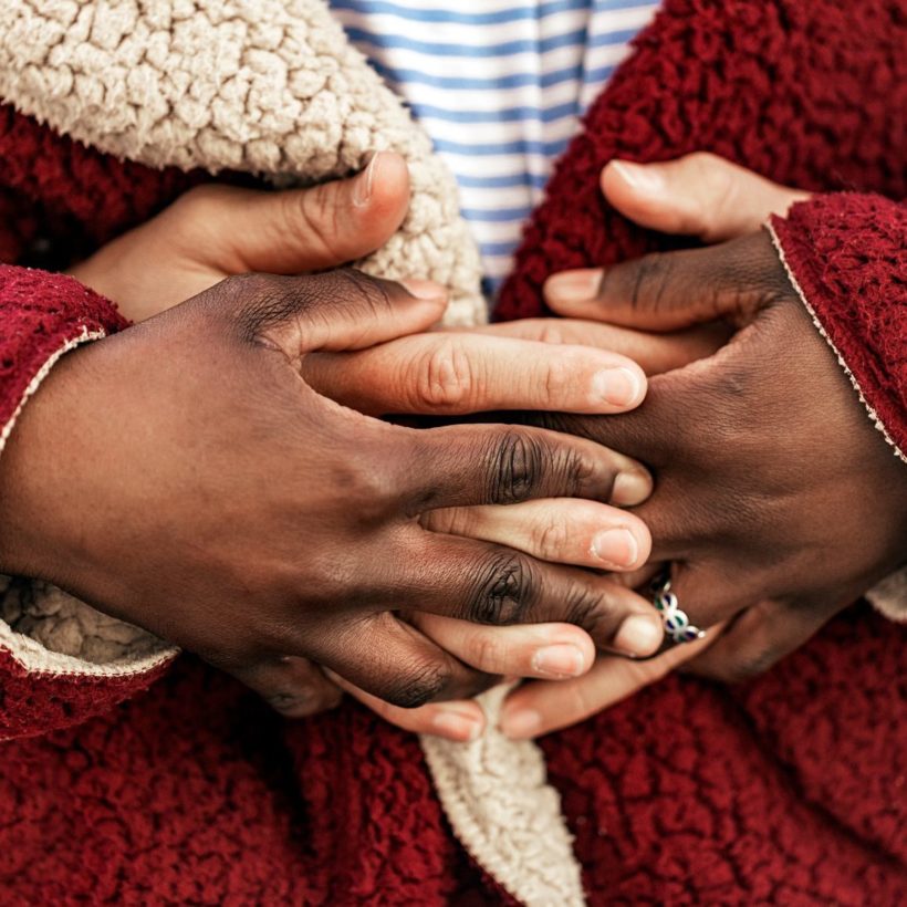 Close up of hands of diverse races