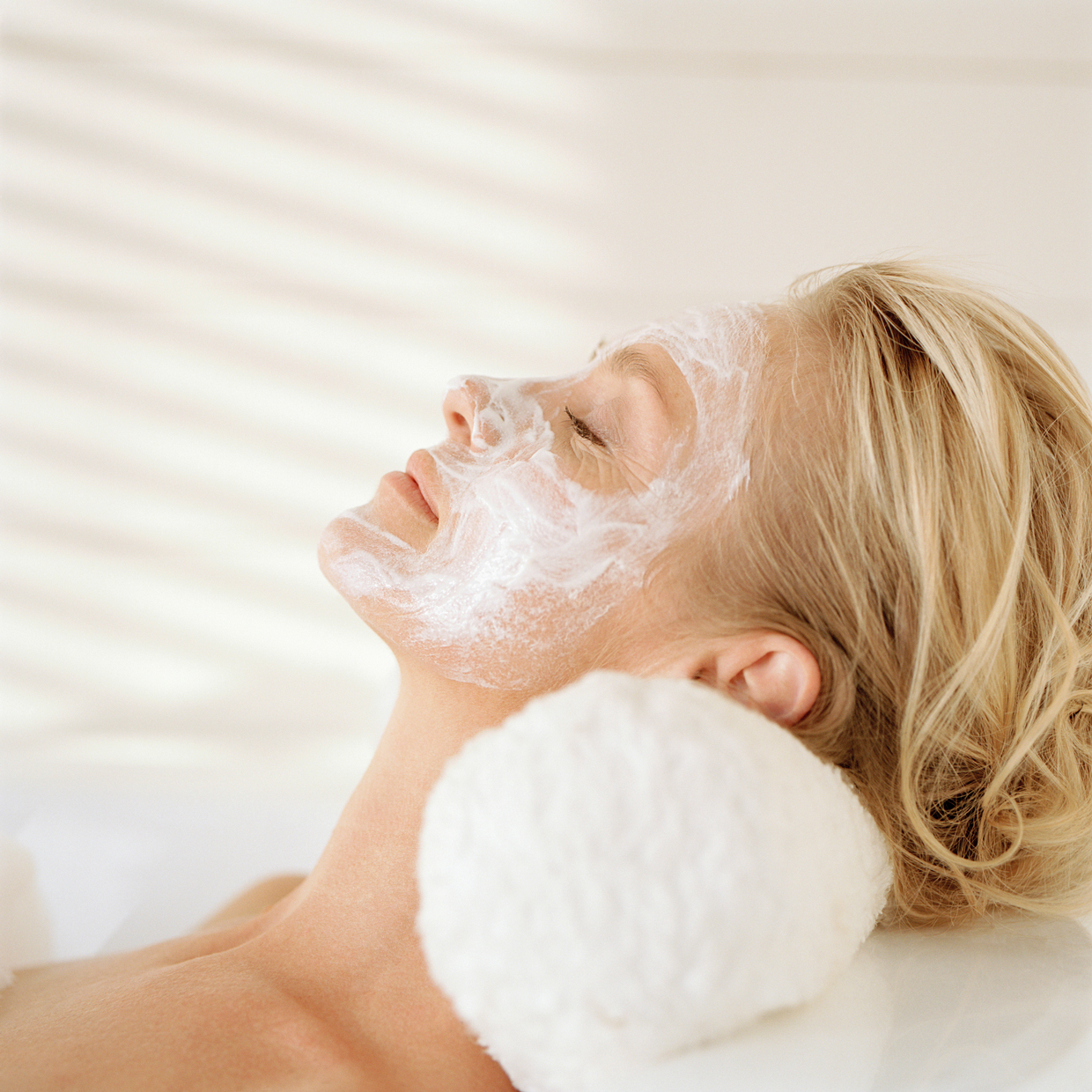 woman wearing facial mask, relaxing