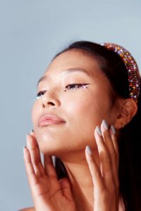 woman with glitter on face