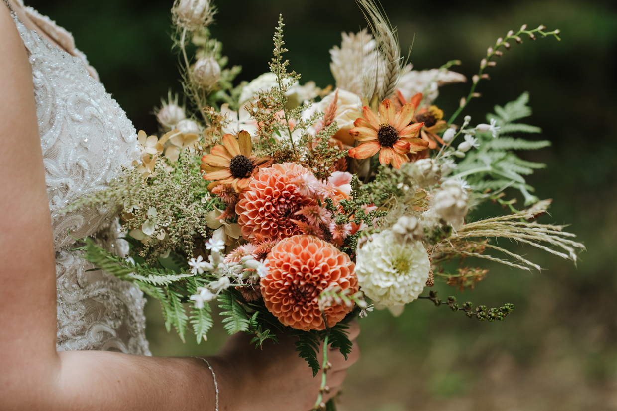 Closeup of Bride Holding Dried Flower Bouquet