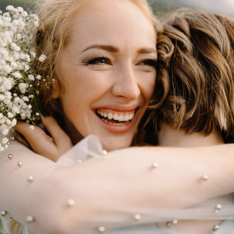 Emotional woman face with tears of happiness