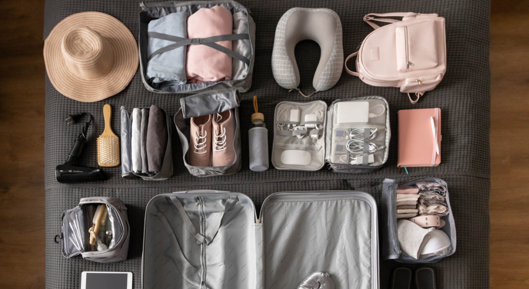 flat lay of travel containers and organization