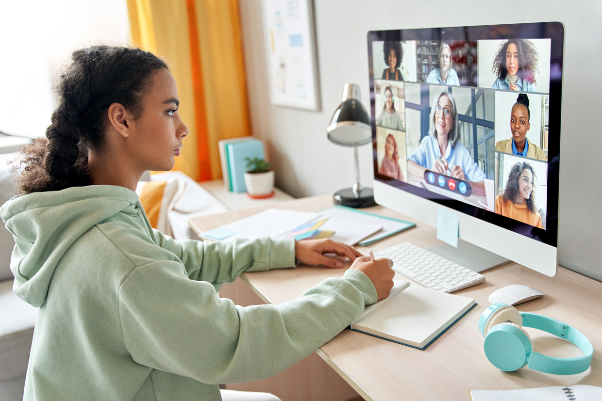girl on zoom video conference in home