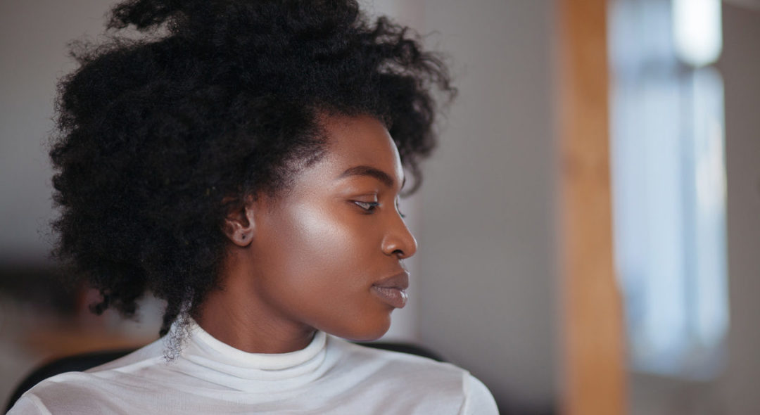 profile of woman with glowing skin