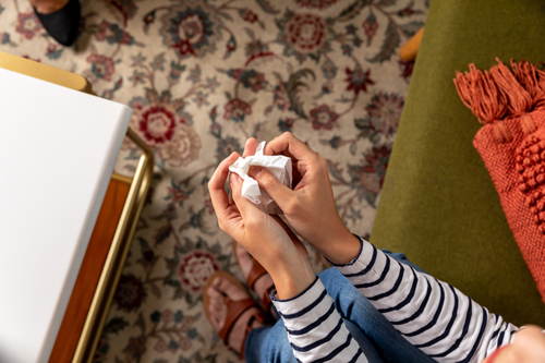 Woman Holding Tissues