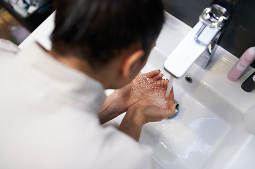 overhead shot of Woman washing face