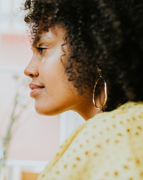 side profiles of woman smiling